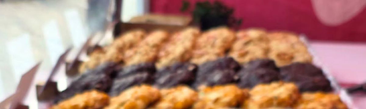 A spread of Dunk'd bakes at a market stall